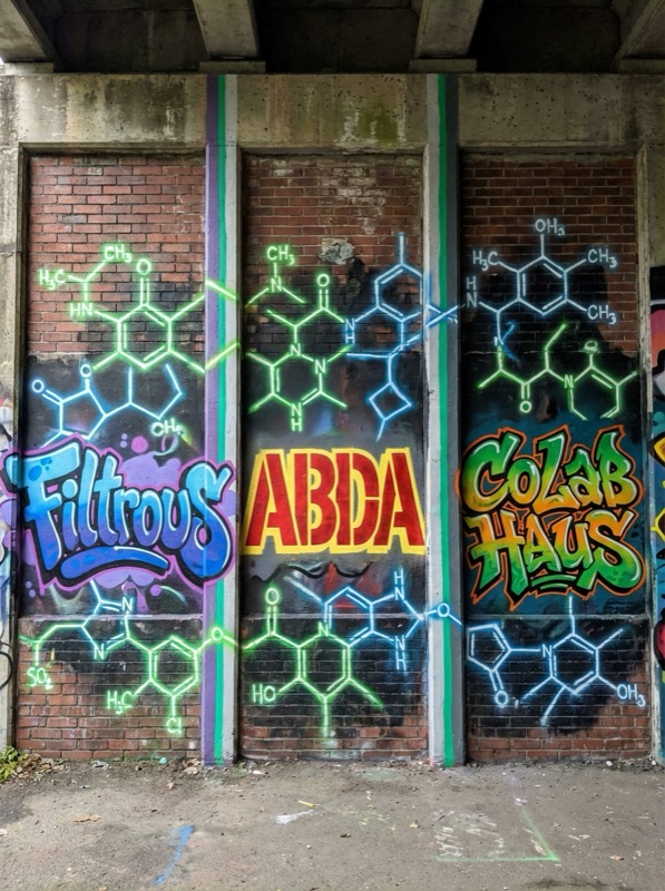 Filtrous, ABDA, and CoLab Haus — graffiti triptych with molecular structures