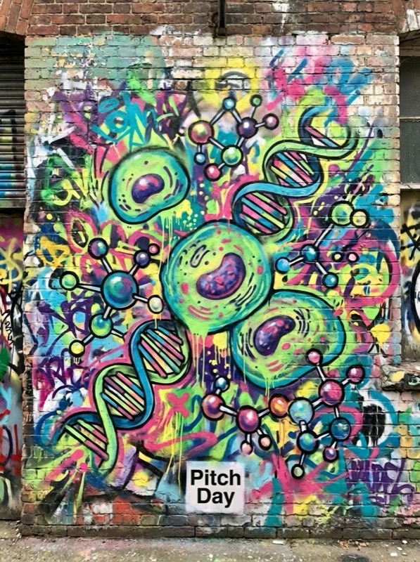 Pitch Day graffiti mural — cells, DNA helices, and molecular structures